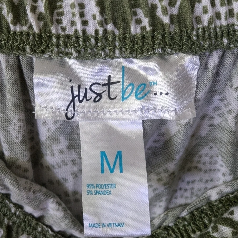Just Be green romper size M NWOT